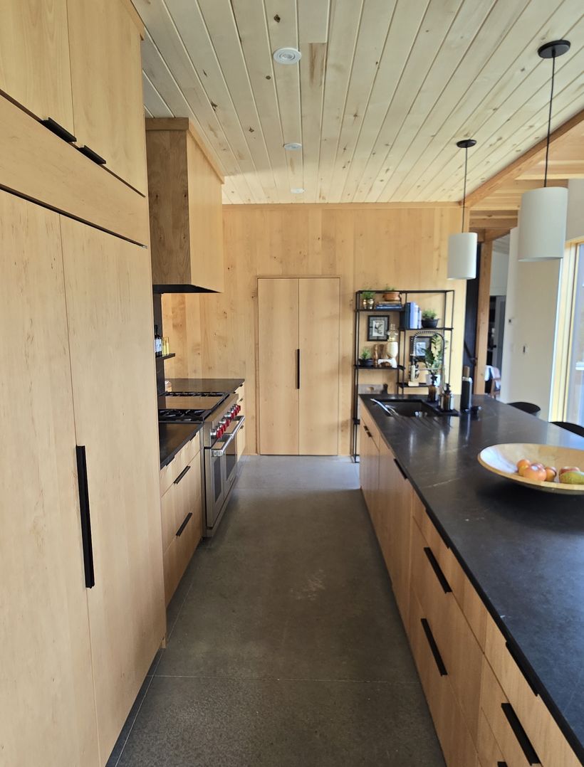custom cabinets and pantry in large mountain home kitchen